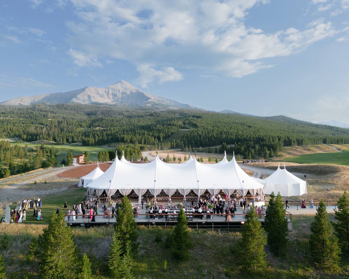 A tented celebration in the mountain landscape at Big Sky